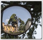 Image No : G28R3C1 :Reflection in a mirror on the way down from the  Vittoriale Museum